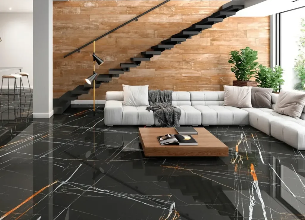 Sala de estar moderna com piso de porcelanato preto com dourado.